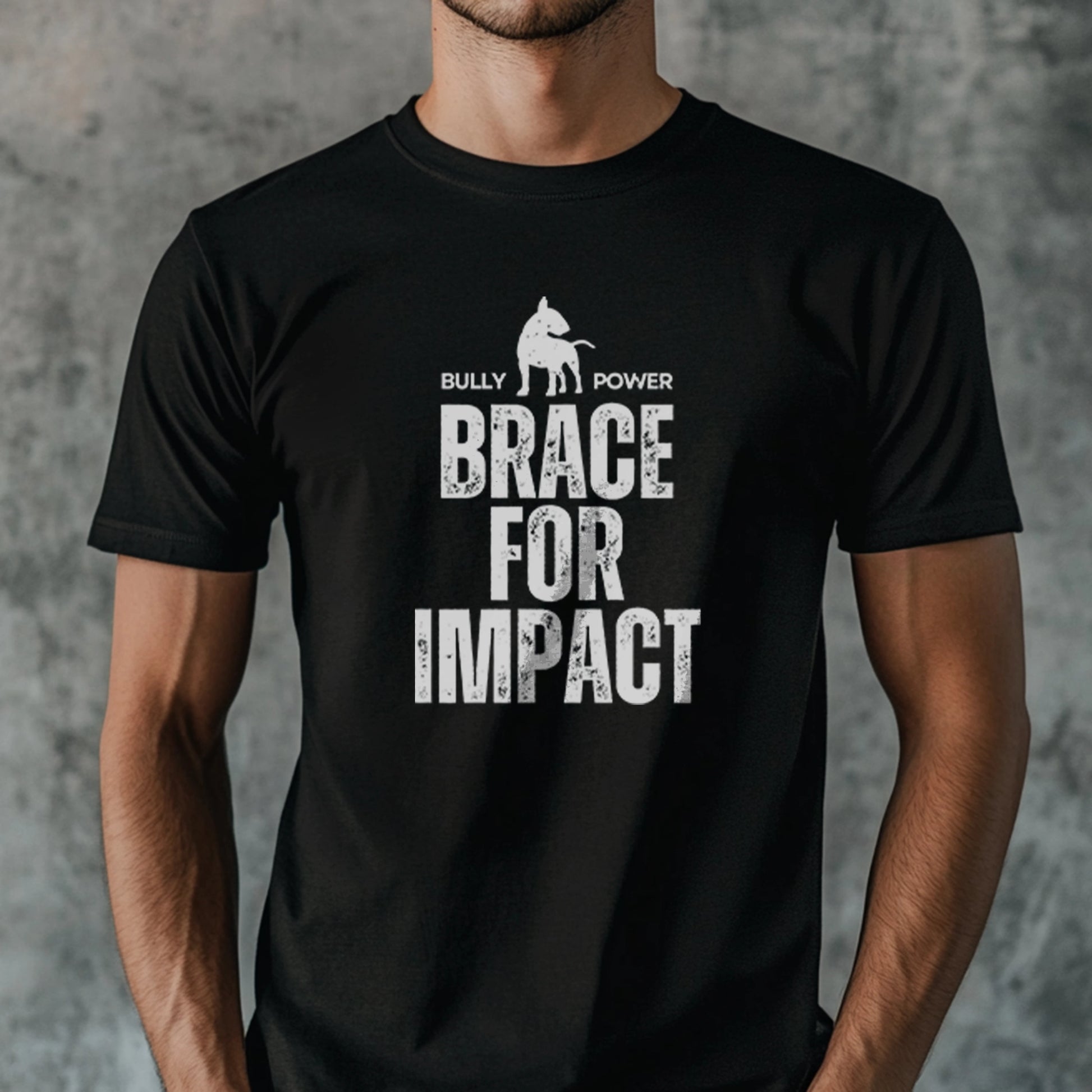 Person wearing a black t-shirt with white text 'Brace for Impact' and graphic design against a gray background