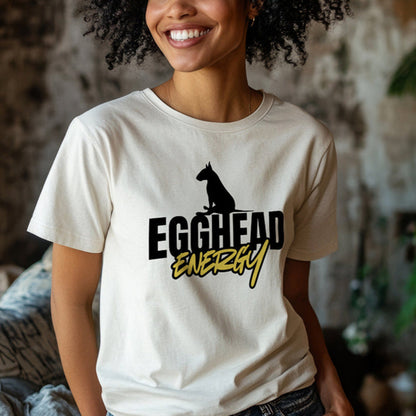 Person wearing a white t-shirt with 'EGGHEAD ENERGY' text and graphic
