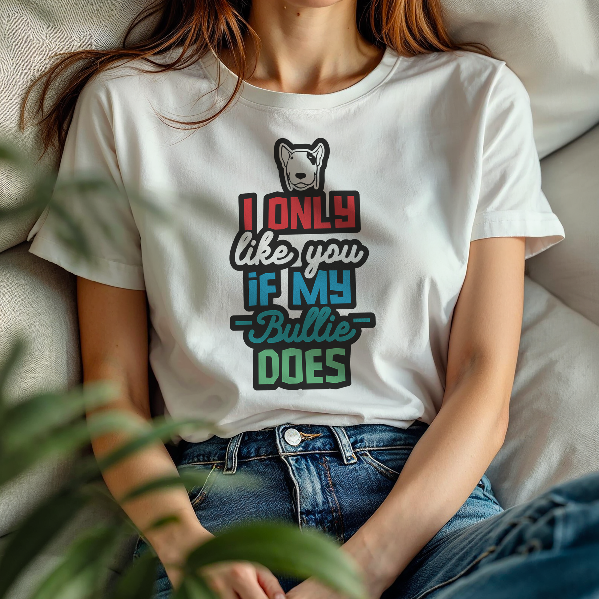 Person wearing a white t-shirt with a graphic and text, "I only like you if my Bully does"