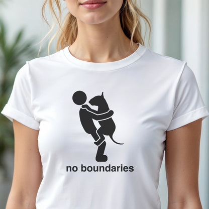 Person wearing a white t-shirt with black graphic of a dog in a persons arms and 'no boundaries' text.