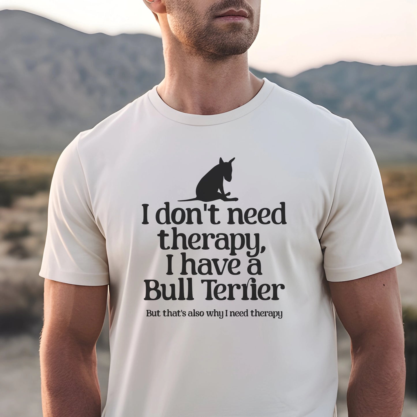 Man wearing a white t-shirt with a Bull Terrier graphic and text 'I don't need therapy, I have a Bull Terrier. But that's also why i need therapy".