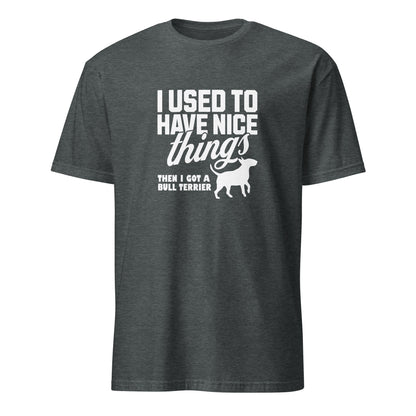 Product mockup of a dark grey  t-shirt with a humorous text design about a Bull Terrier, "I used to have nice things, then i got a Bull Terrier".
