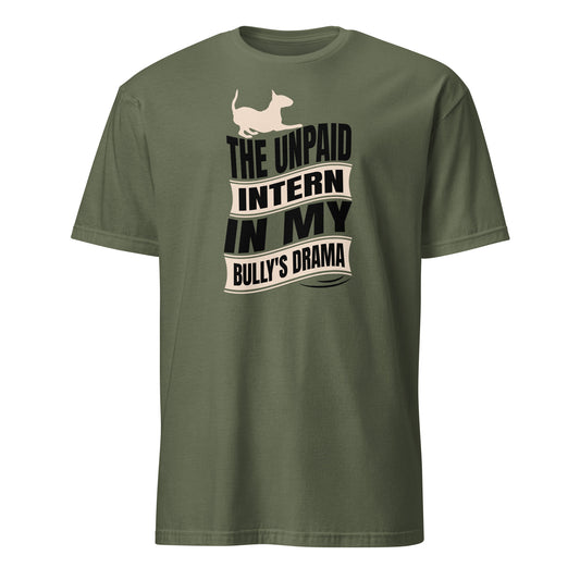 Product mockup of a military green t-shirt with a graphic text reading "The unpaid intern in my bully's drama", with a graphic of a playful bull terrier. 