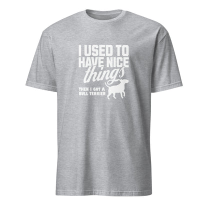 Product mockup of a light grey  t-shirt with a humorous text design about a Bull Terrier, "I used to have nice things, then i got a Bull Terrier".